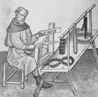 Bild 3 - Paternosterer im Mönchsgwand mit dem Fiedelbohrer hantierend.